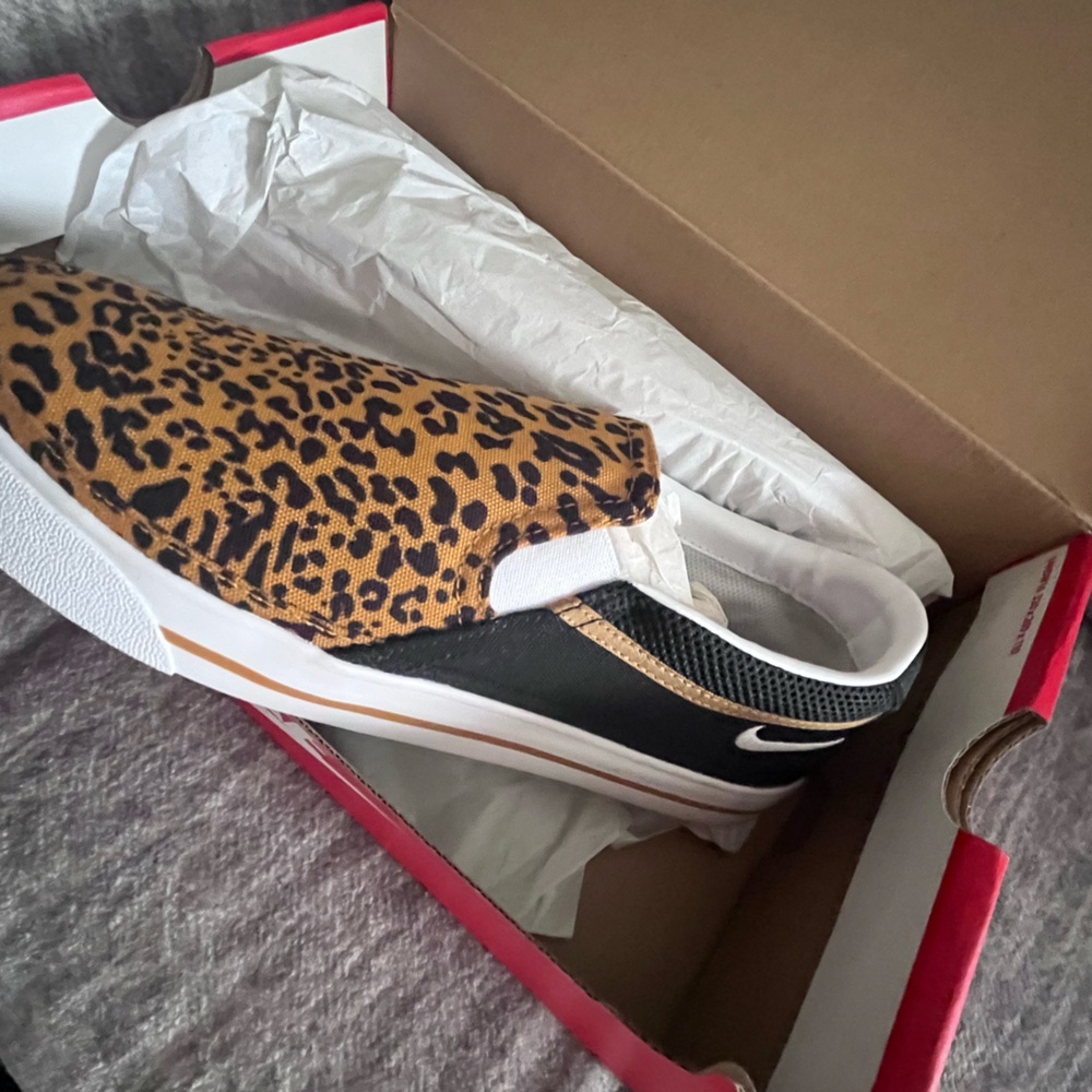 Nike Women's Black and Brown Leopard Slip-On Sneakers